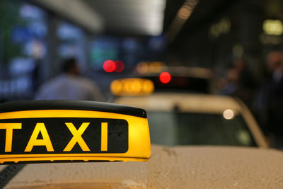 Close-up of yellow text on car