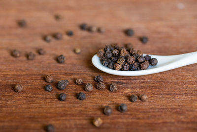 Close-up of coffee beans on table