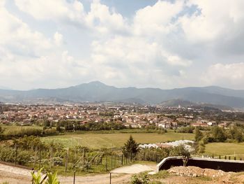 Scenic view of townscape against sky