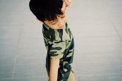 High angle view of boy dancing on floor