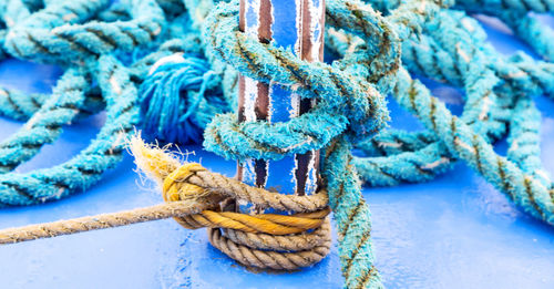 High angle view of rope tied on boat