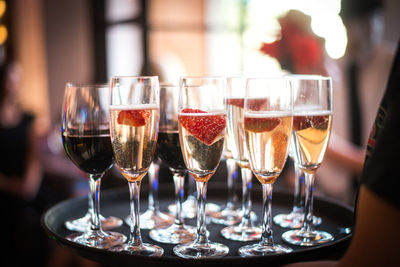 Close-up of wine glasses on table