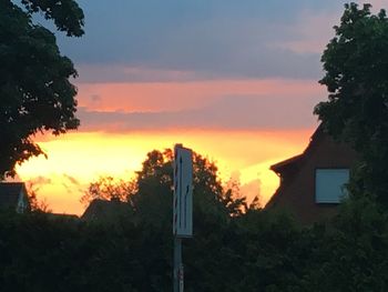 Silhouette of house at sunset