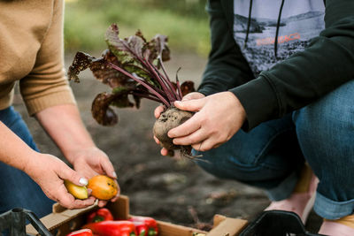 Midsection of man preparing food