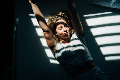 High angle view of young woman at home