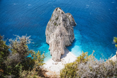 High angle view of rock formation in sea