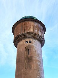 Low angle view of water tower against sky