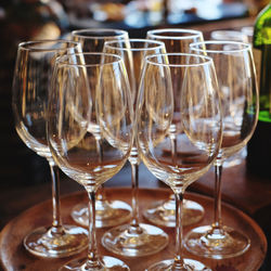 Close-up of wine glasses on table