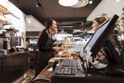 Woman working in a store