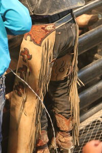 Close-up of man holding umbrella