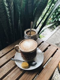 Close-up of coffee cup on table