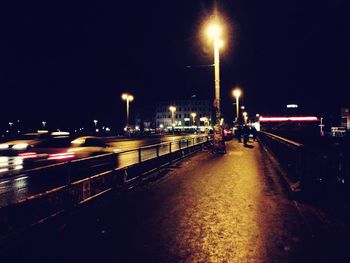 Illuminated street light at night