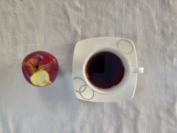 High angle view of coffee cup on table