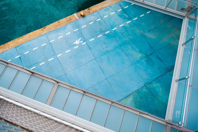 High angle view of swimming pool against building