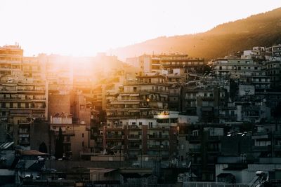 Crowded residential buildings at sunset