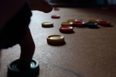 Close-up of hand on table