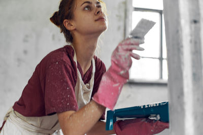 Young woman using mobile phone