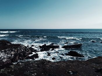 Scenic view of sea against clear sky