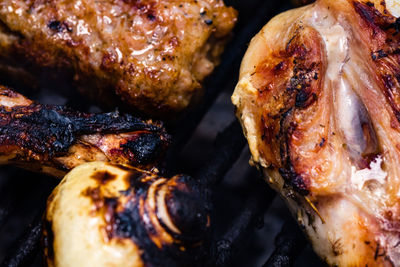 Close-up of meat on barbecue grill