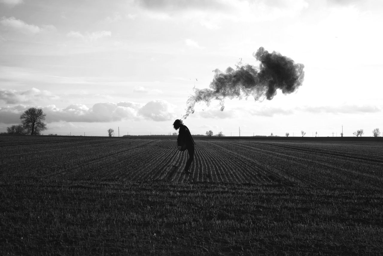 sky, growth, agriculture, field, tree, outdoors, landscape, cloud - sky, nature, rural scene, land vehicle, day, real people, scenics, beauty in nature, one person, men