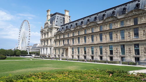 View of buildings against blue sky