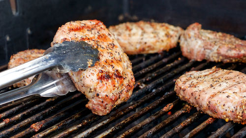 Close-up of meat on barbecue grill