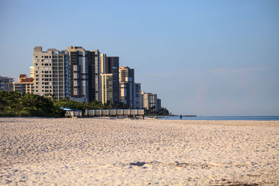 Buildings on the beach in the distance at clam pass in naples, florida