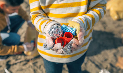 High angle view of woman holding ice cream