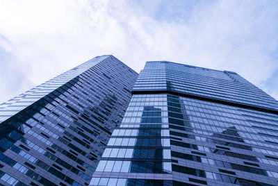 Low angle view of modern building against sky