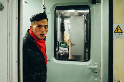 Portrait of man in train