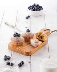 High angle view of cupcakes on table against white background