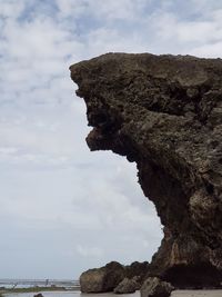 Low angle view of rock formations on coast