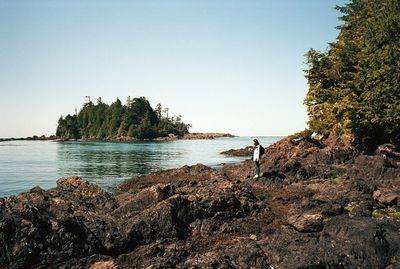 Scenic view of calm sea against clear sky