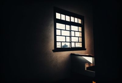 Window of house in dark room