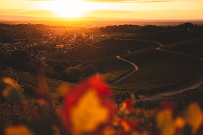 Aerial view of landscape against sky during sunset