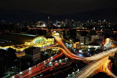 High angle view of illuminated cityscape at night
