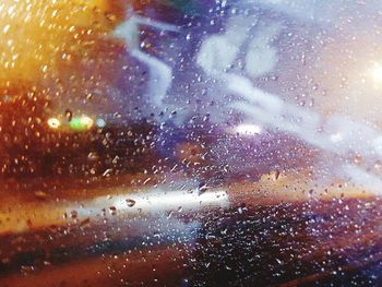 Full frame shot of wet car window