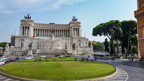 Group of people in front of historical building