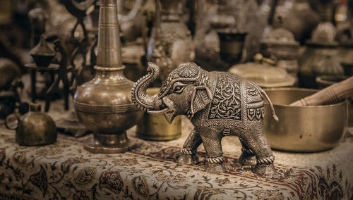 Detailed close-up elephant figurine made of metal. copper utensils. jordanian souvenir shop.