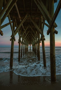 Pier on sea against sky