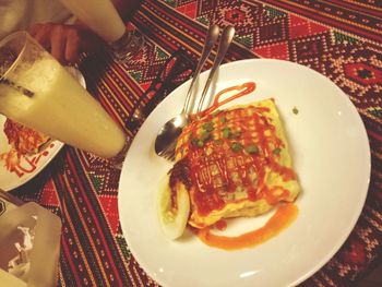 Close-up of food served on table