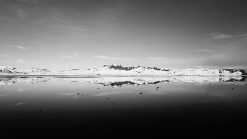 Scenic view of sea against sky during winter