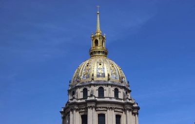 Low angle view of cathedral against blue sky