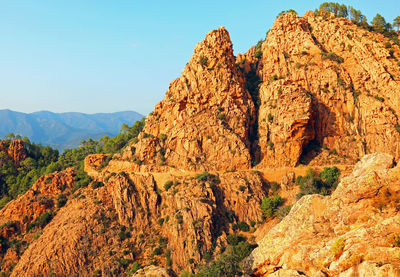 Badlands called calanques de piana in corsica france at sunset