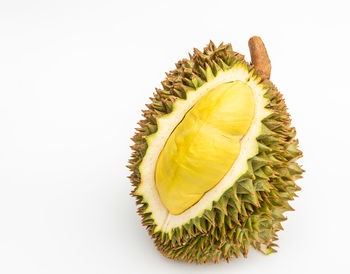 Close-up of fruit against white background