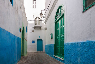 Narrow alley along buildings