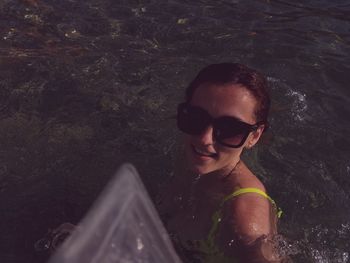 Portrait of smiling woman in water