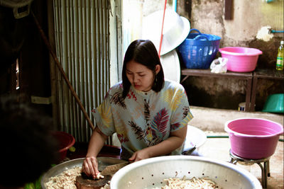 Woman preparing food at home