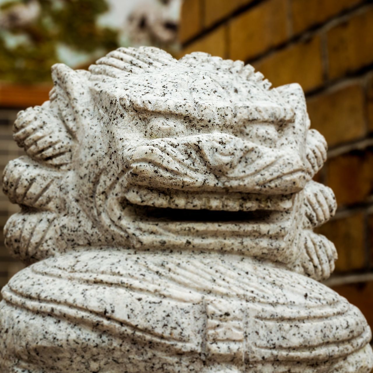 no people, close-up, focus on foreground, statue, sculpture, textured, day, outdoors