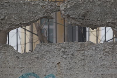 Close-up of rock against wall